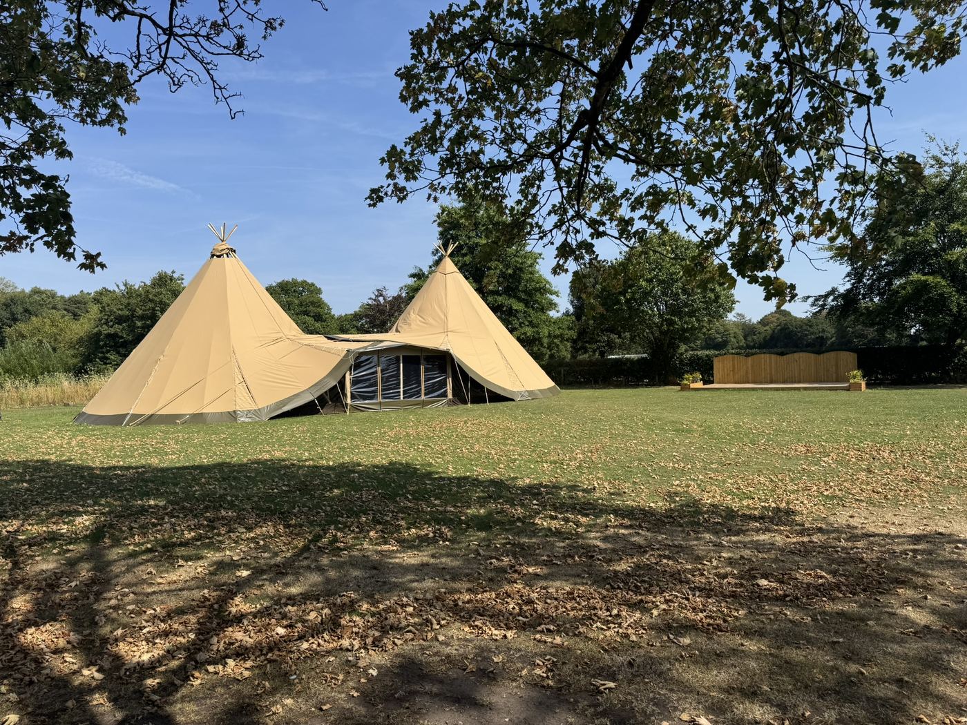 A linked twin Nordic tipi classroom standing in school grounds