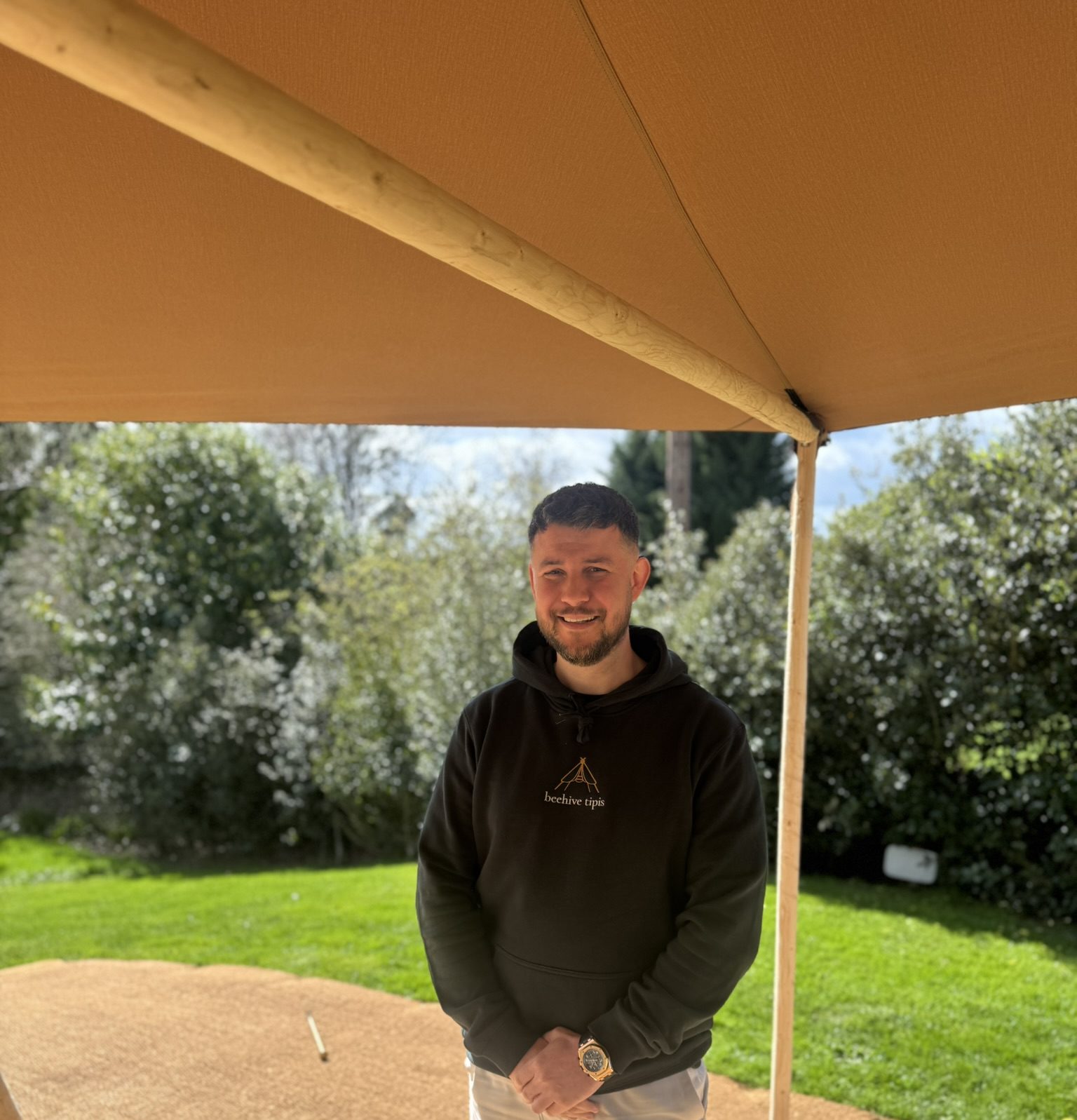 David, Co-Founder of Beehive Tipis, standing inside a Nordic tipi outdoor classroom